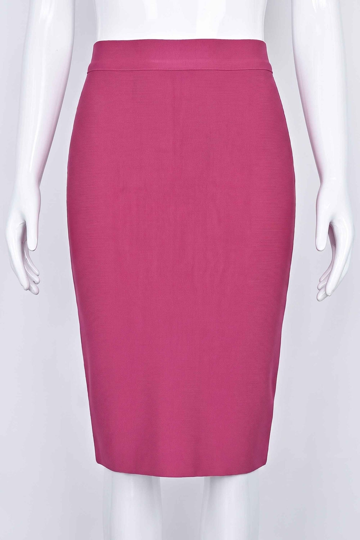 Woman wearing a figure flattering Pencil High Waist Bandage Knee Length Skirt - Magenta Pink BODYCON COLLECTION