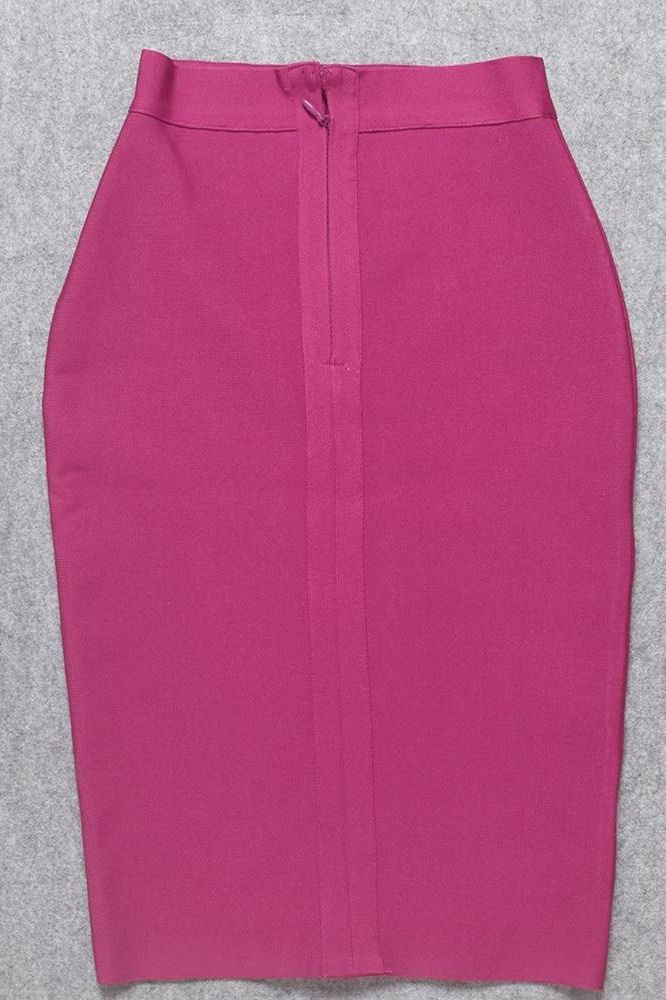 Woman wearing a figure flattering  Pencil High Waist Bandage Knee Length Skirt - Magenta Pink BODYCON COLLECTION