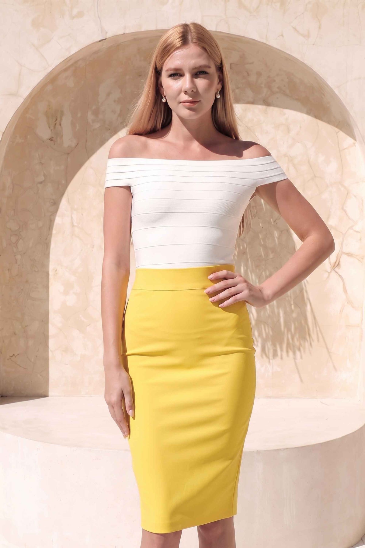 Woman wearing a figure flattering Pencil High Waist Bandage Knee Length Skirt - Sun Yellow BODYCON COLLECTION