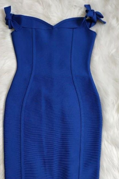 Woman wearing a figure flattering Penelope Bandage Mini Dress - Royal Blue BODYCON COLLECTION