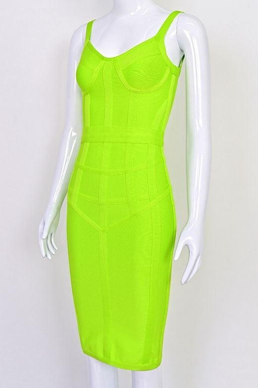 Woman wearing a figure flattering Pip Bandage Corset Dress - Neon Green Bodycon Collection