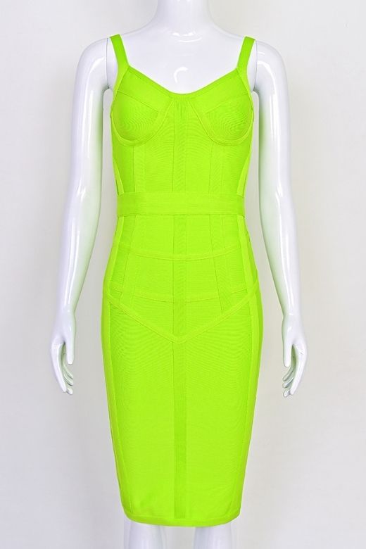 Woman wearing a figure flattering Pip Bandage Corset Dress - Neon Green Bodycon Collection