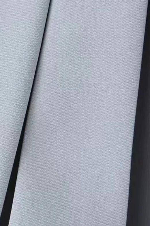 Woman wearing a figure flattering Pleated Sports Mini Skirt - Classic Black BODYCON COLLECTION Pty Ltd