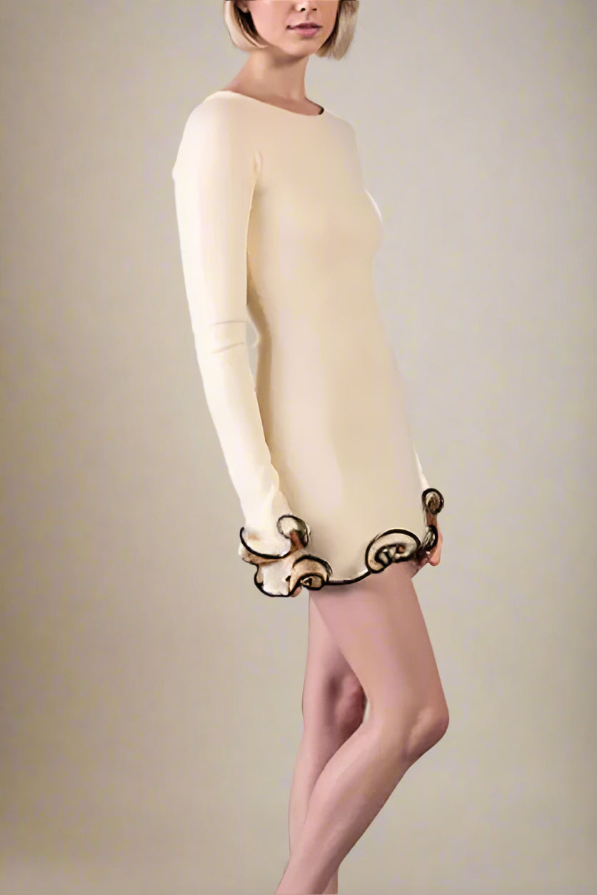 Woman wearing a figure flattering Regina Long Sleeve Bodycon Mini Dress - Cream BODYCON COLLECTION