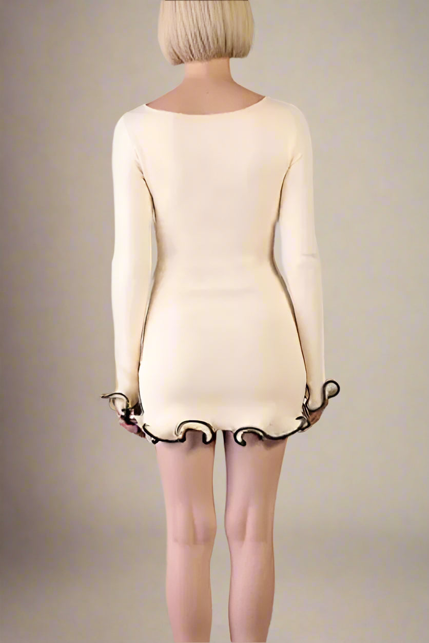 Woman wearing a figure flattering Regina Long Sleeve Bodycon Mini Dress - Cream BODYCON COLLECTION