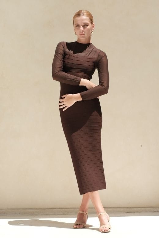 Woman wearing a figure flattering Robin Long Sleeve Bandage Maxi Dress - Tan Brown BODYCON COLLECTION Pty Ltd