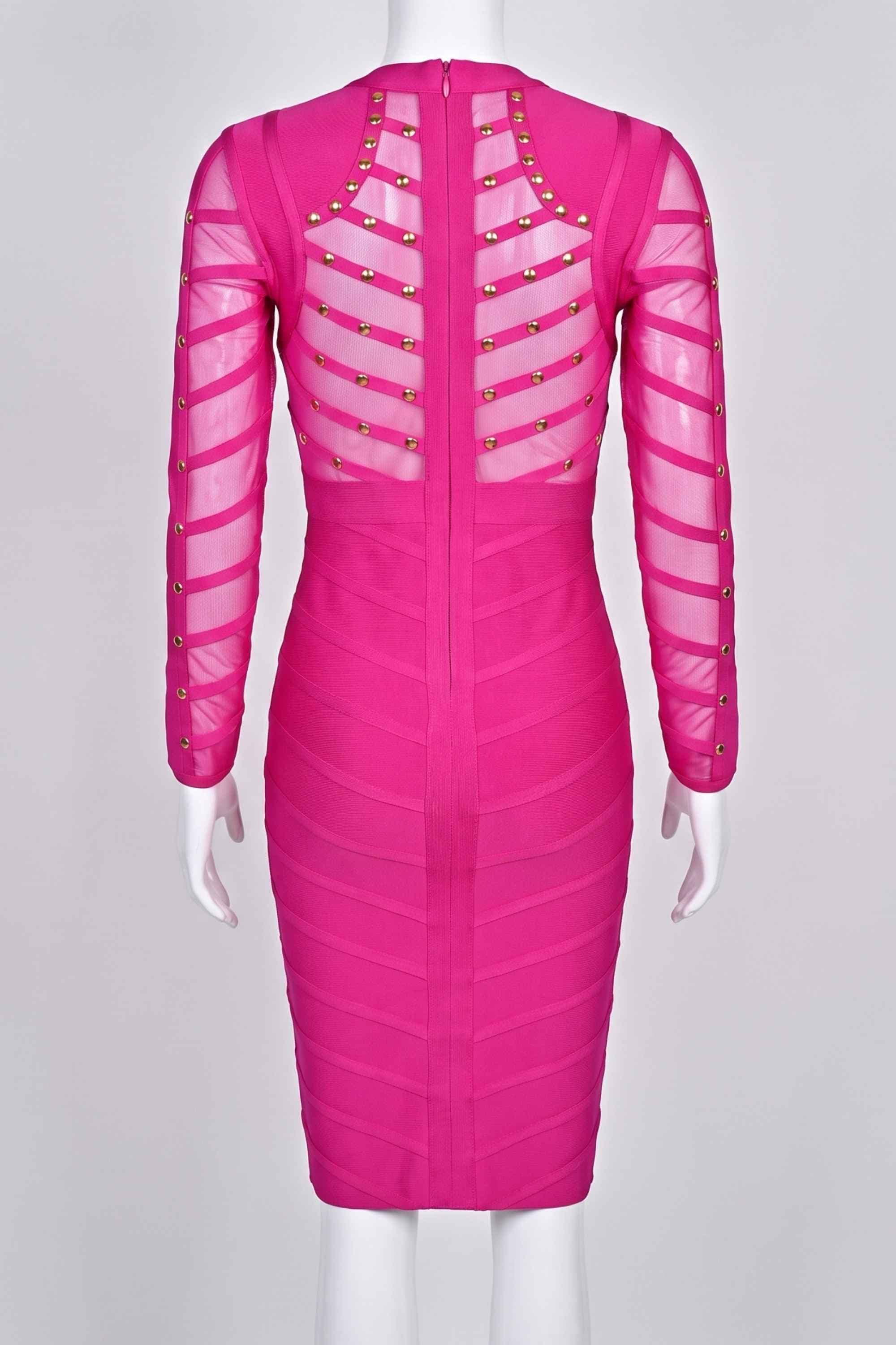 Woman wearing a figure flattering Rosa Long Sleeve Bodycon Dress - Hot Pink BODYCON COLLECTION
