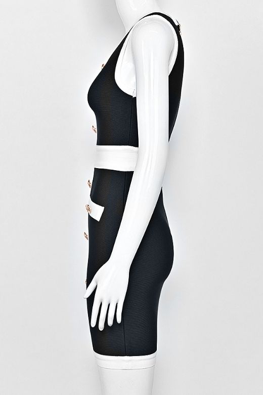 Woman wearing a figure flattering Rosie Bodycon Dress - Classic Black BODYCON COLLECTION