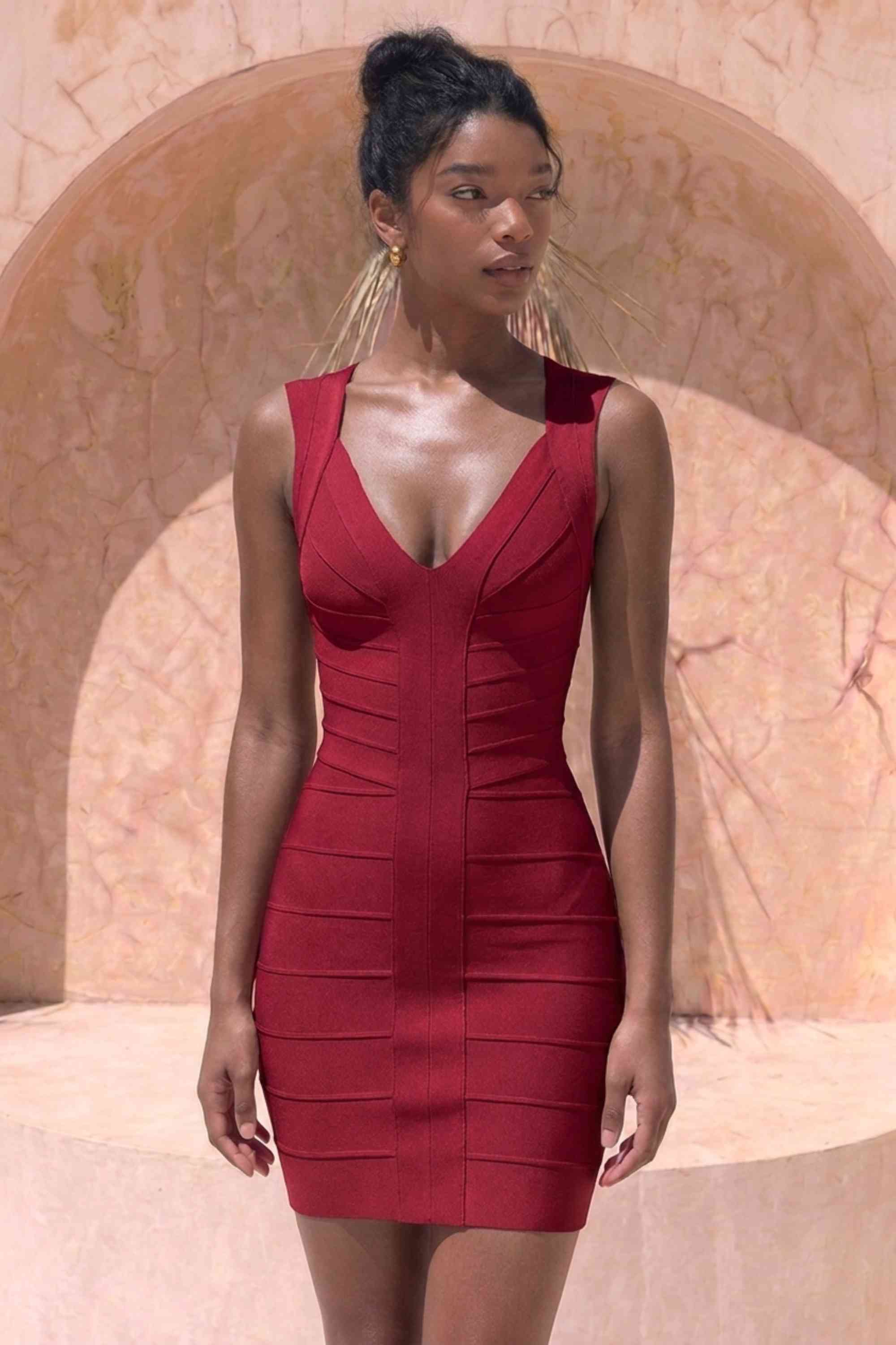 Woman wearing a figure flattering Sabrina Bandage Mini Dress - Red Wine BODYCON COLLECTION Pty Ltd