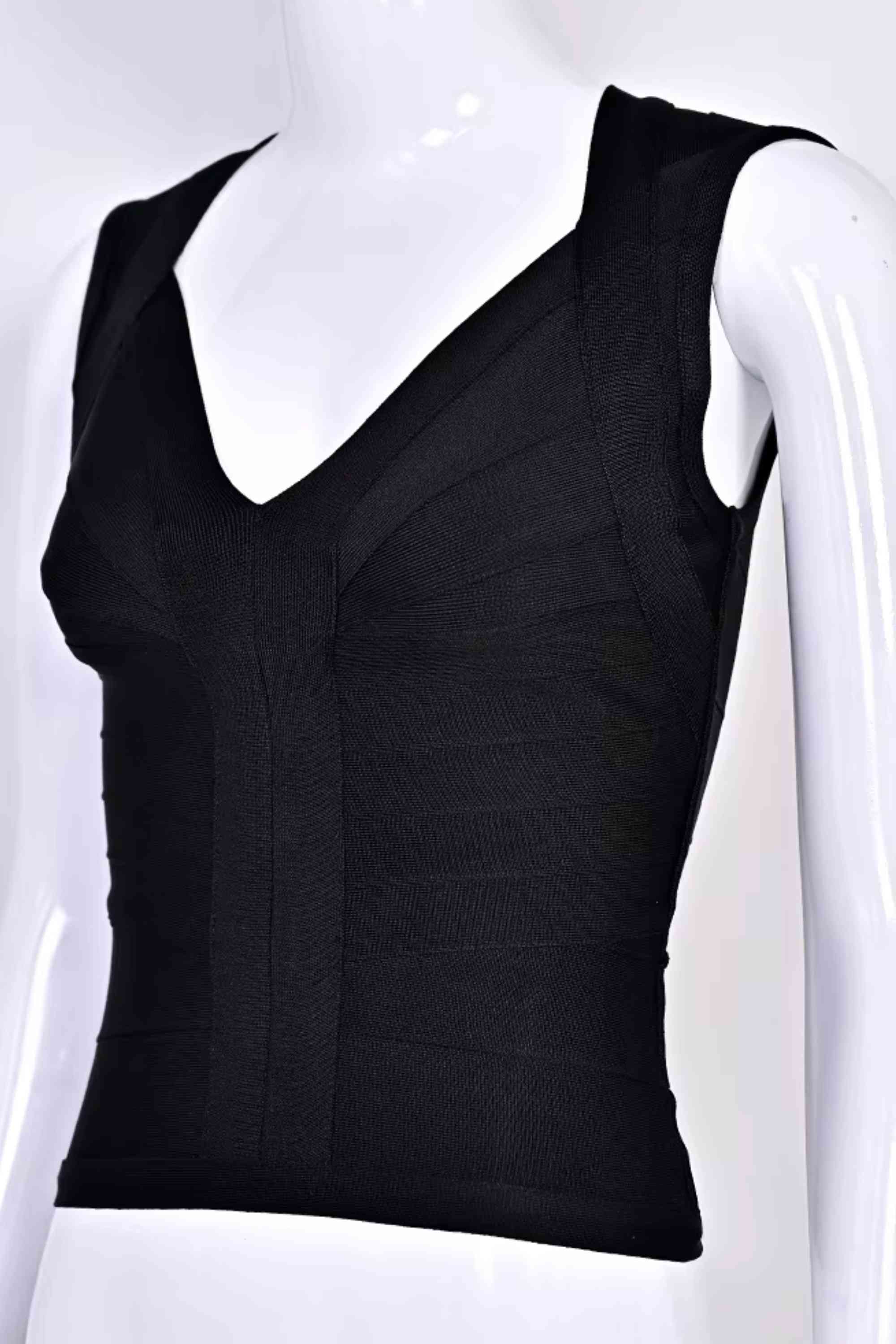 Woman wearing a figure flattering Sabrina Bandage Top - Classic Black BODYCON COLLECTION Pty Ltd