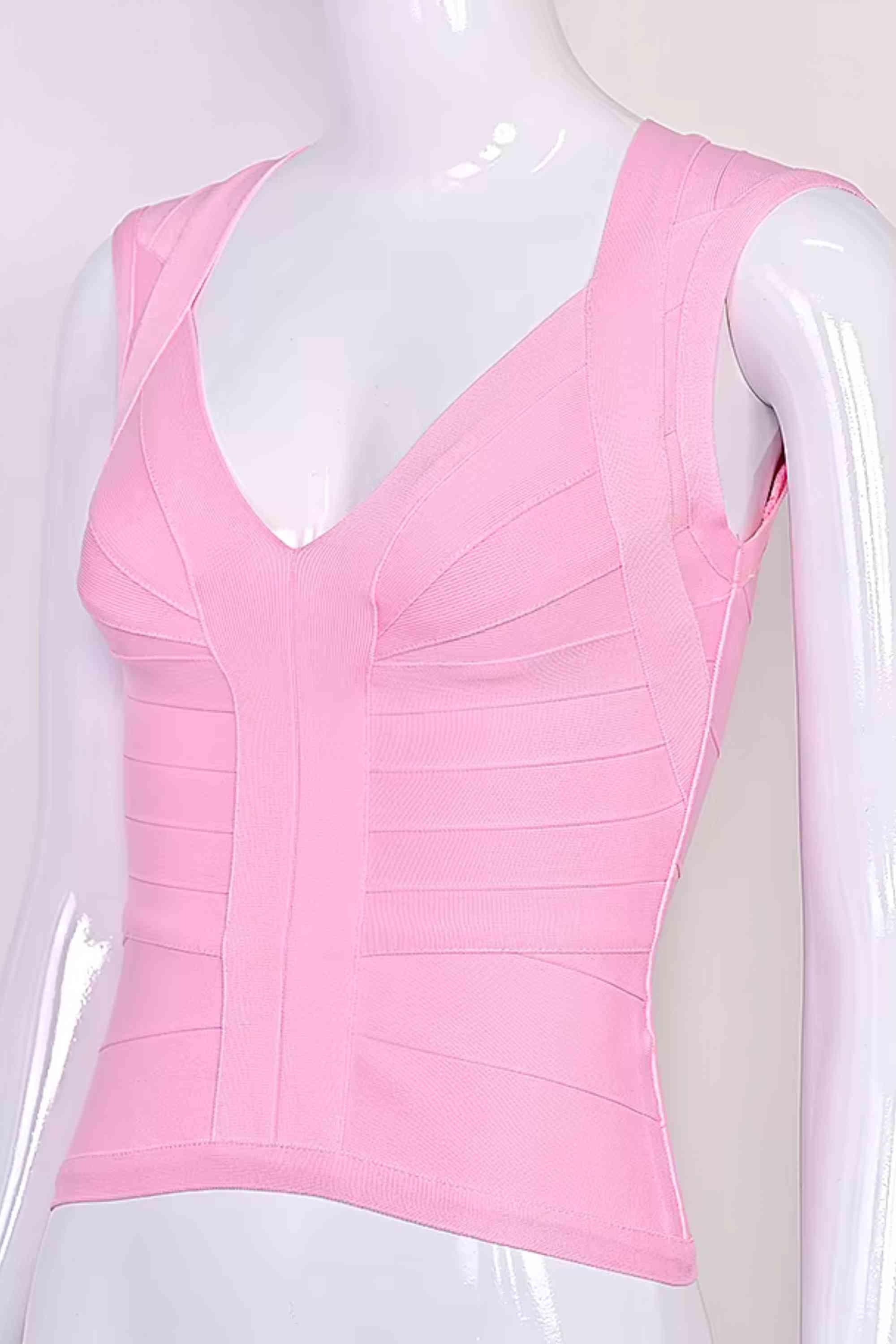 Woman wearing a figure flattering Sabrina Bandage Top - Dusty Pink BODYCON COLLECTION Pty Ltd