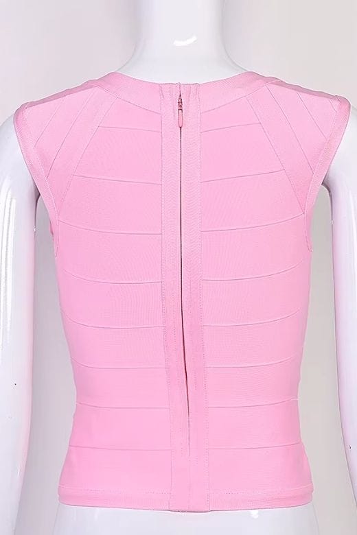 Woman wearing a figure flattering Sabrina Bandage Top - Dusty Pink BODYCON COLLECTION Pty Ltd