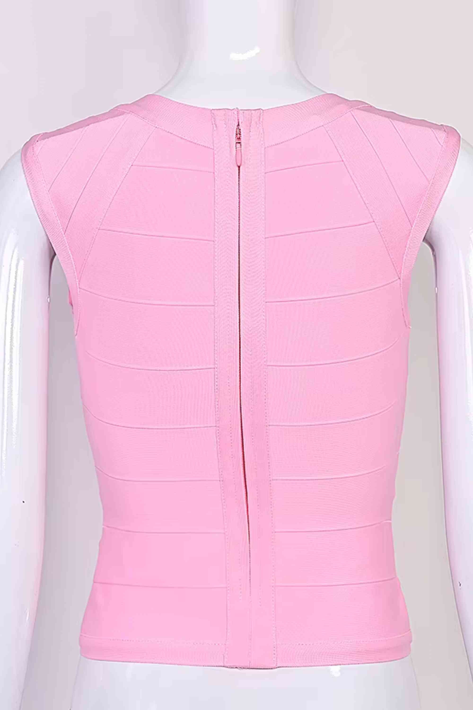 Woman wearing a figure flattering Sabrina Bandage Top - Dusty Pink BODYCON COLLECTION Pty Ltd