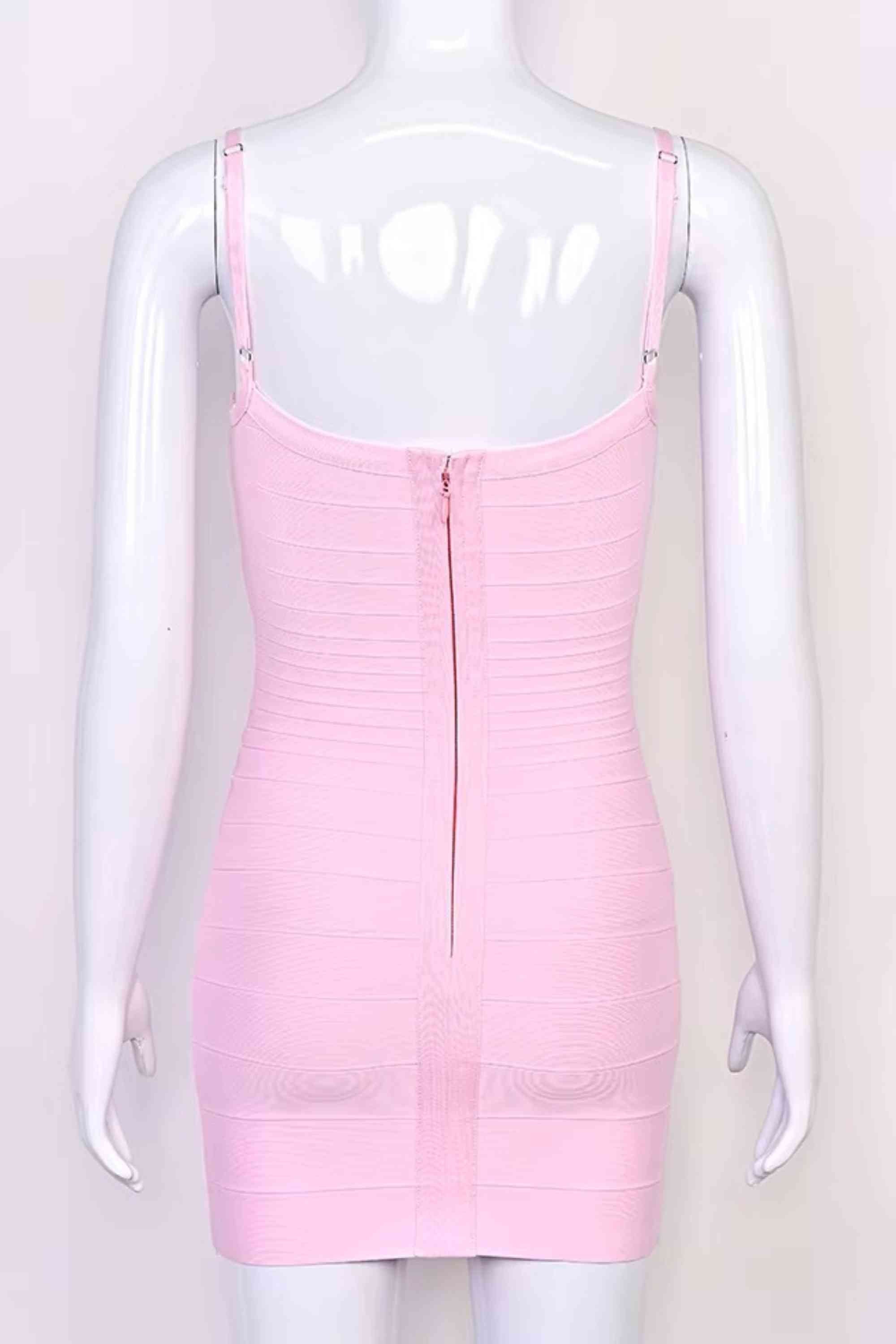 Woman wearing a figure flattering Scarlett Bandage Mini Dress - Dusty Pink BODYCON COLLECTION Pty Ltd