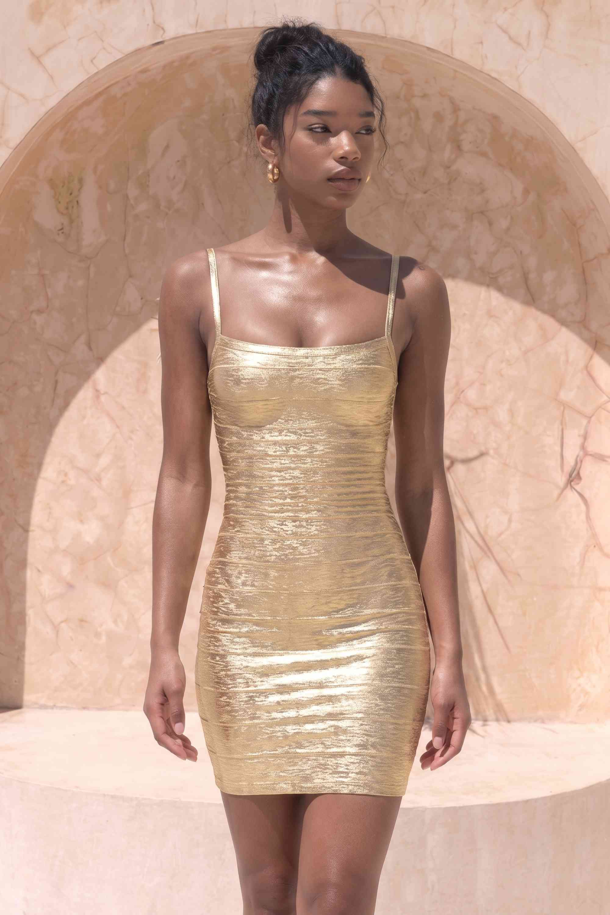 Woman wearing a figure flattering Scarlett Bandage Mini Dress - Gold BODYCON COLLECTION Pty Ltd