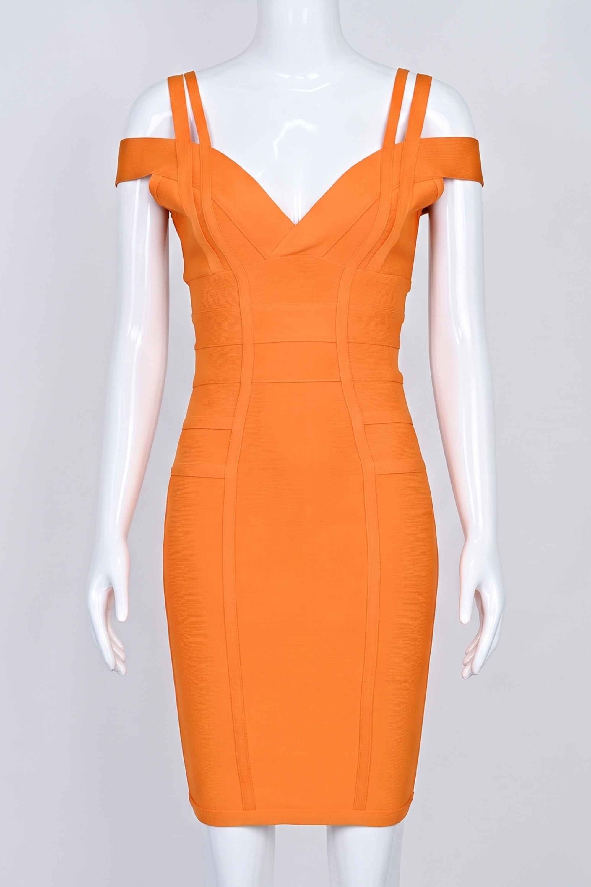 Woman wearing a figure flattering Sia Bandage Dress - Apricot Orange Bodycon Collection