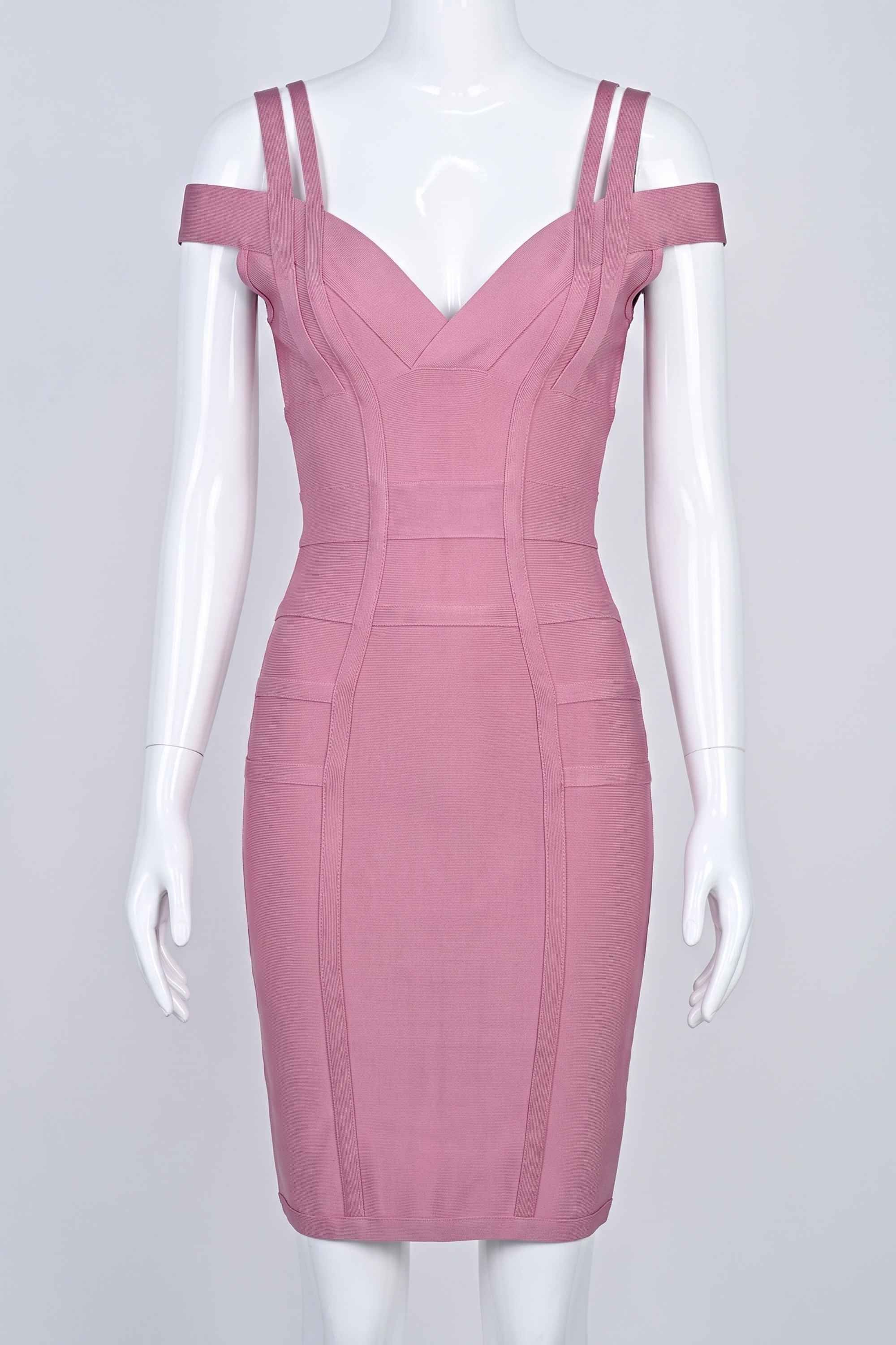 Woman wearing a figure flattering Sia Bandage Dress - Ballet Pink Bodycon Collection