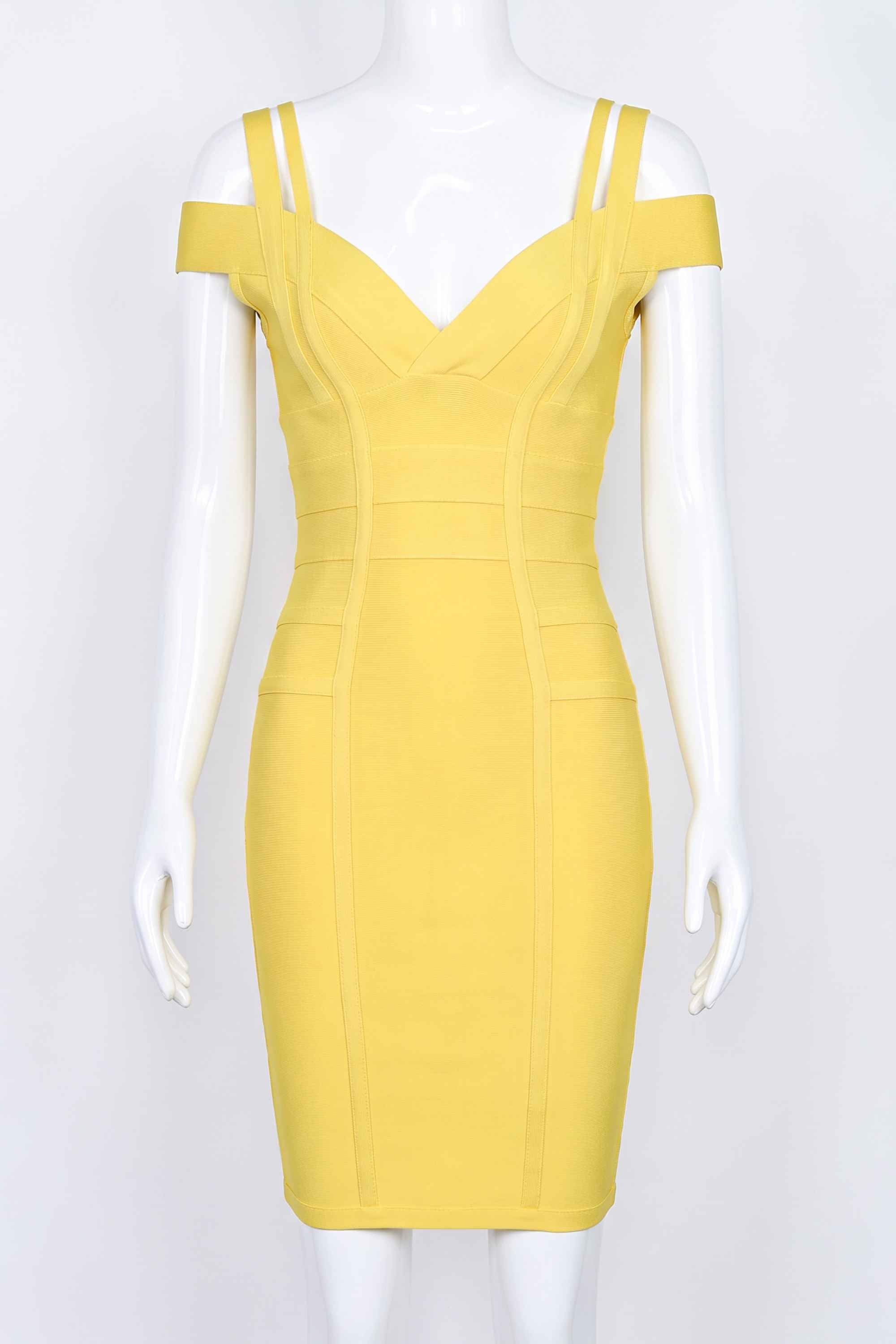 Woman wearing a figure flattering Sia Bandage Dress - Sun Yellow Bodycon Collection