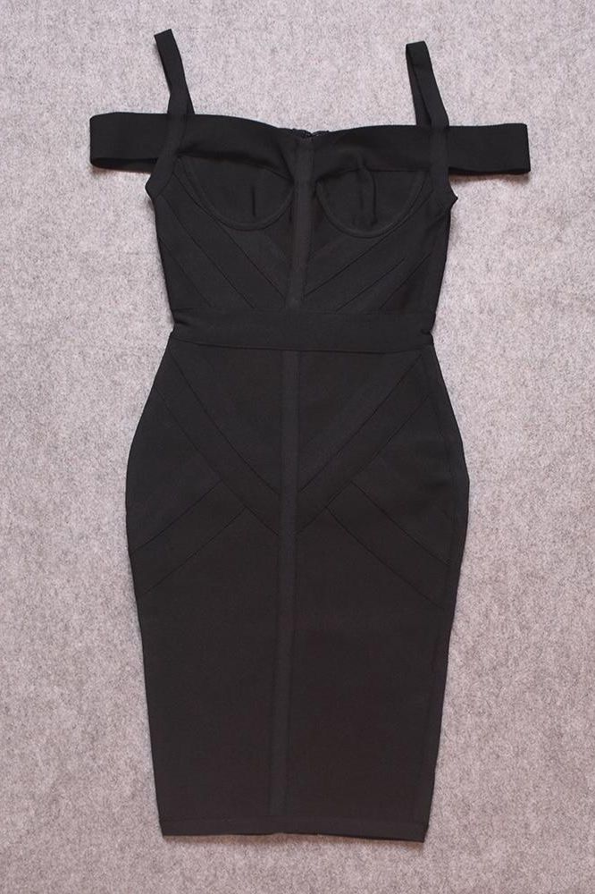 Woman wearing a figure flattering Sophia Bandage Dress - Classic Black Bodycon Collection