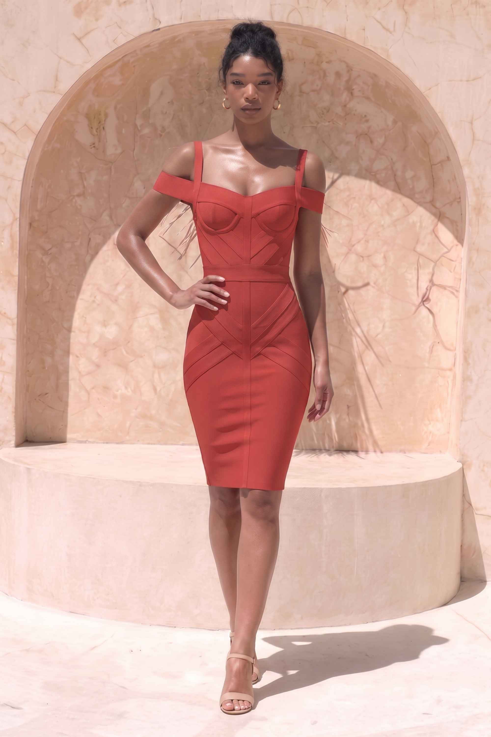 Woman wearing a figure flattering Sophia Bandage Dress - Lipstick Red Bodycon Collection