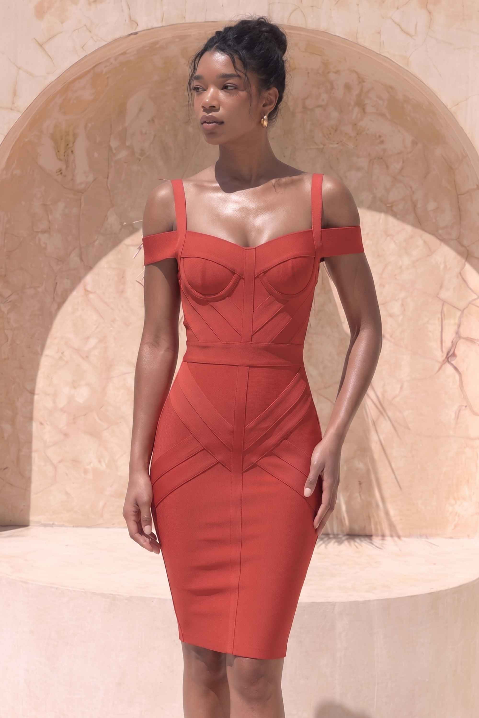 Woman wearing a figure flattering Sophia Bandage Dress - Lipstick Red Bodycon Collection