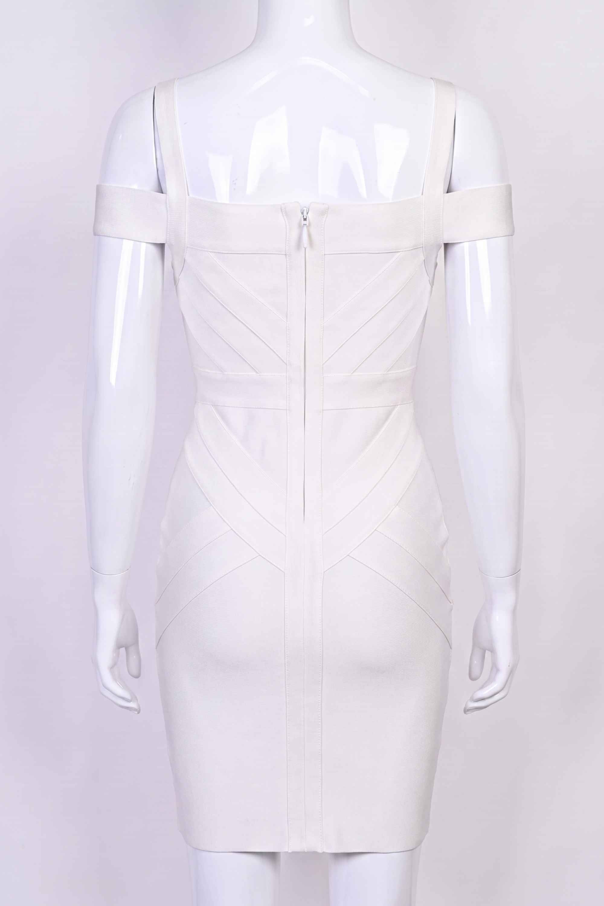 Woman wearing a figure flattering Sophia Bandage Dress - Pearl White Bodycon Collection
