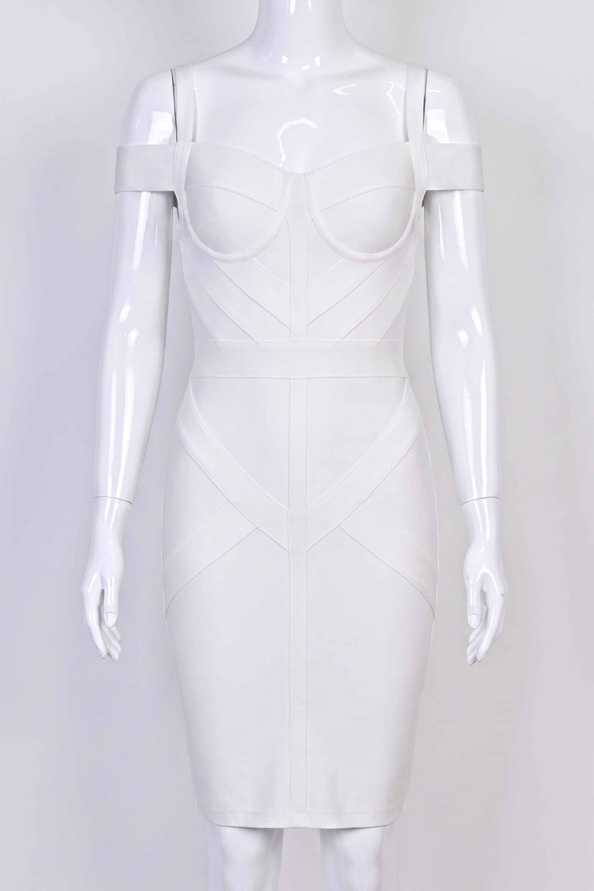 Woman wearing a figure flattering Sophia Bandage Dress - Pearl White Bodycon Collection