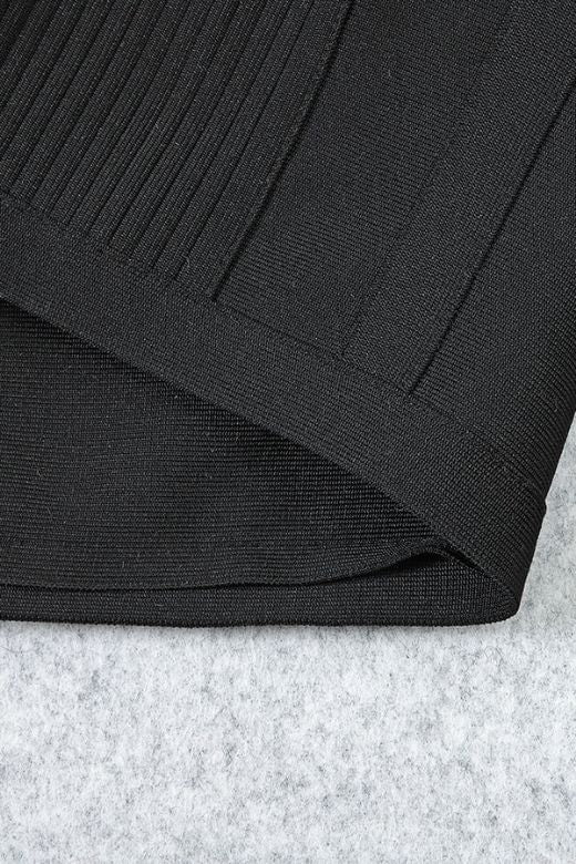 Woman wearing a figure flattering Sophia Bandage Mini Dress - Classic Black Bodycon Collection