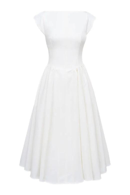 Woman wearing a figure flattering Stella Bodycon Midi Dress - White Pearl BODYCON COLLECTION