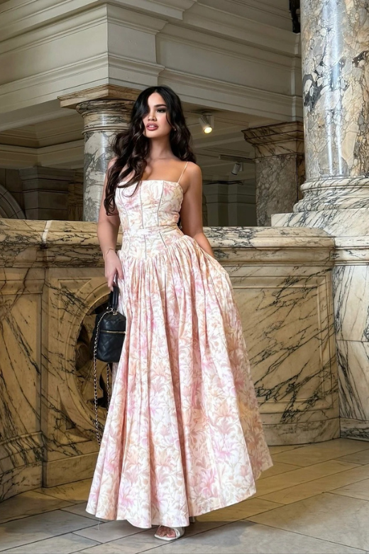 Woman wearing a figure flattering Tasmin Midi Dress - Pink Print BODYCON COLLECTION