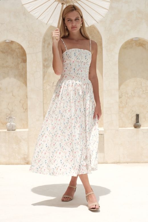 Woman wearing a figure flattering Tasmin Midi Dress - White Pearl BODYCON COLLECTION