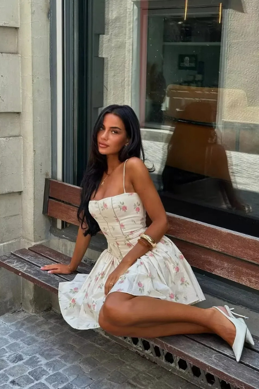 Woman wearing a figure flattering Tasmin Mini Dress - Cream BODYCON COLLECTION