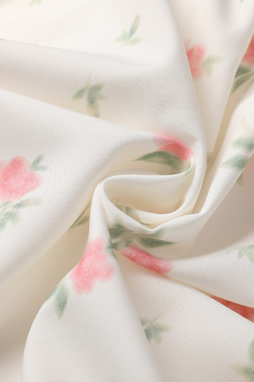 Woman wearing a figure flattering Tasmin Mini Dress - Cream BODYCON COLLECTION