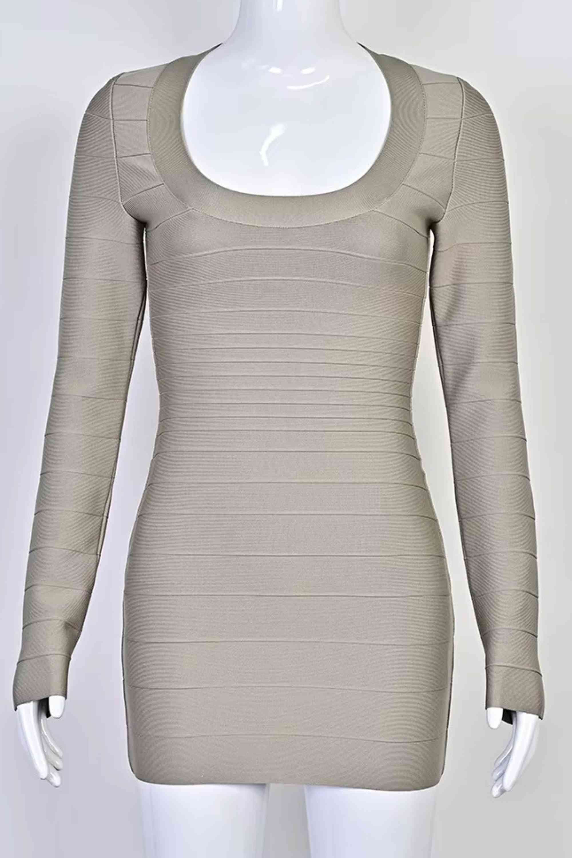 Woman wearing a figure flattering Valentina Long Sleeve Bandage Mini Dress - Oyster Grey BODYCON COLLECTION Pty Ltd