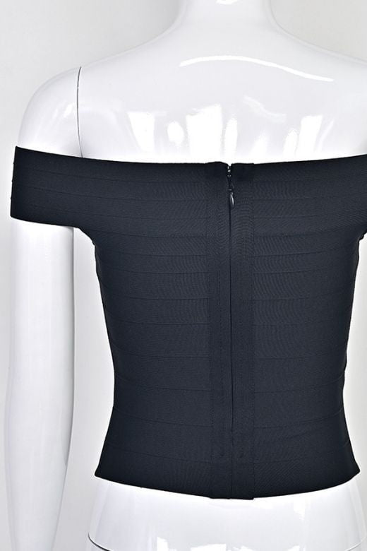 Woman wearing a figure flattering Vera Bandage Off Shoulder Top - White Pearl BODYCON COLLECTION Pty Ltd