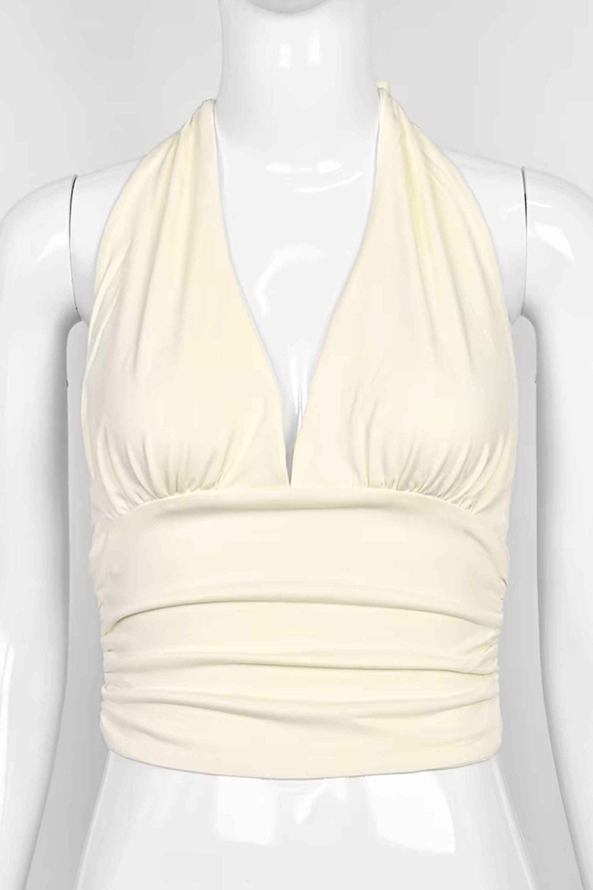 Woman wearing a figure flattering  Aby Halter Top - Butter Yellow BODYCON COLLECTION Pty Ltd