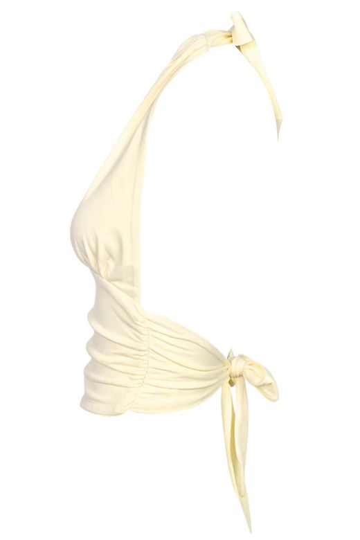 Woman wearing a figure flattering  Aby Halter Top - Butter Yellow BODYCON COLLECTION Pty Ltd