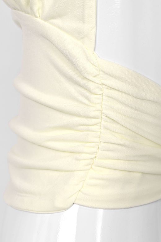 Woman wearing a figure flattering  Aby Halter Top - Butter Yellow BODYCON COLLECTION Pty Ltd