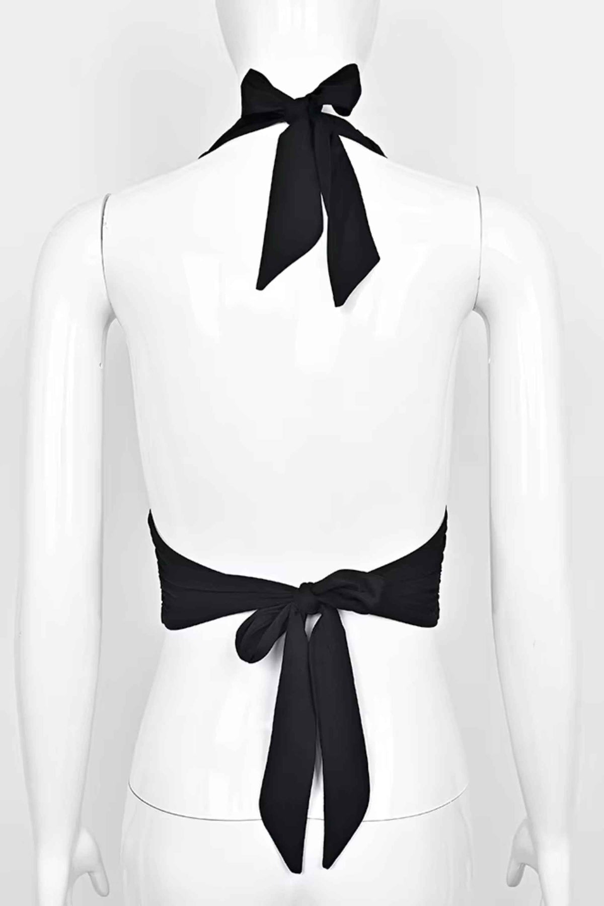 Woman wearing a figure flattering  Aby Halter Top - Classic Black BODYCON COLLECTION Pty Ltd