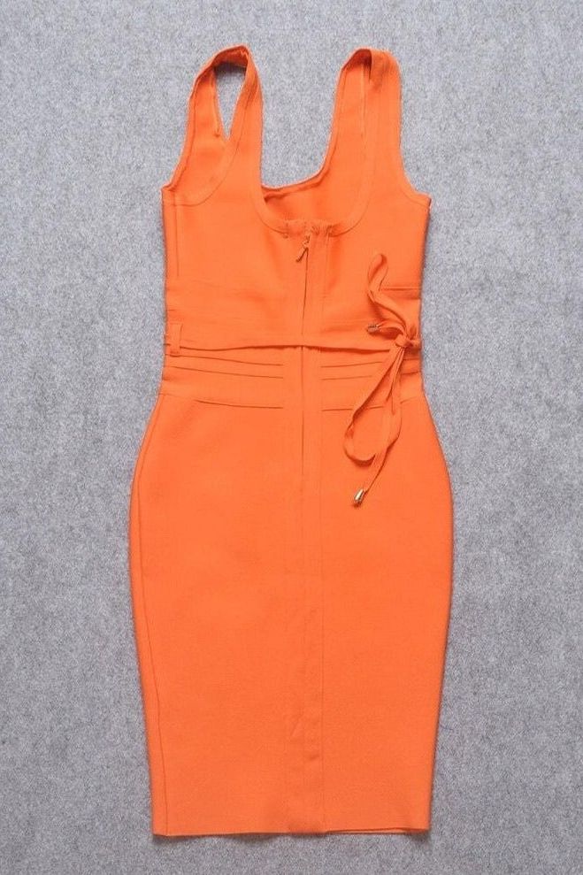 Woman wearing a figure flattering  Amy Bandage Dress - Apricot Orange Bodycon Collection