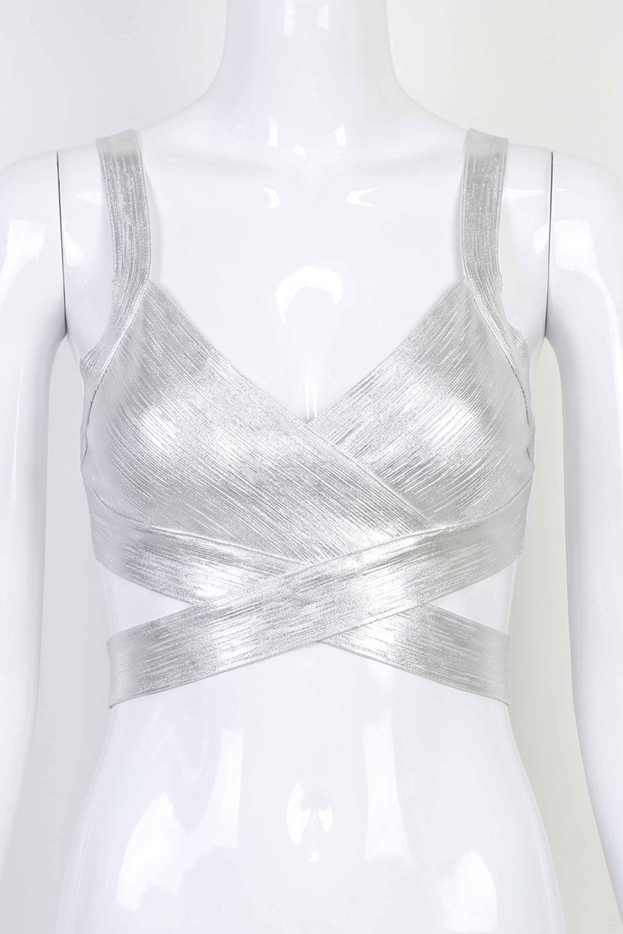 Woman wearing a figure flattering  Ang Bandage Crop Top - Silver BODYCON COLLECTION