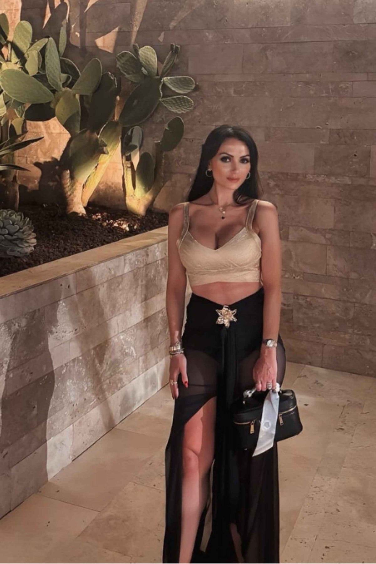 Woman wearing a figure flattering  Ang Bandage Leather Crop Top - Gold BODYCON COLLECTION