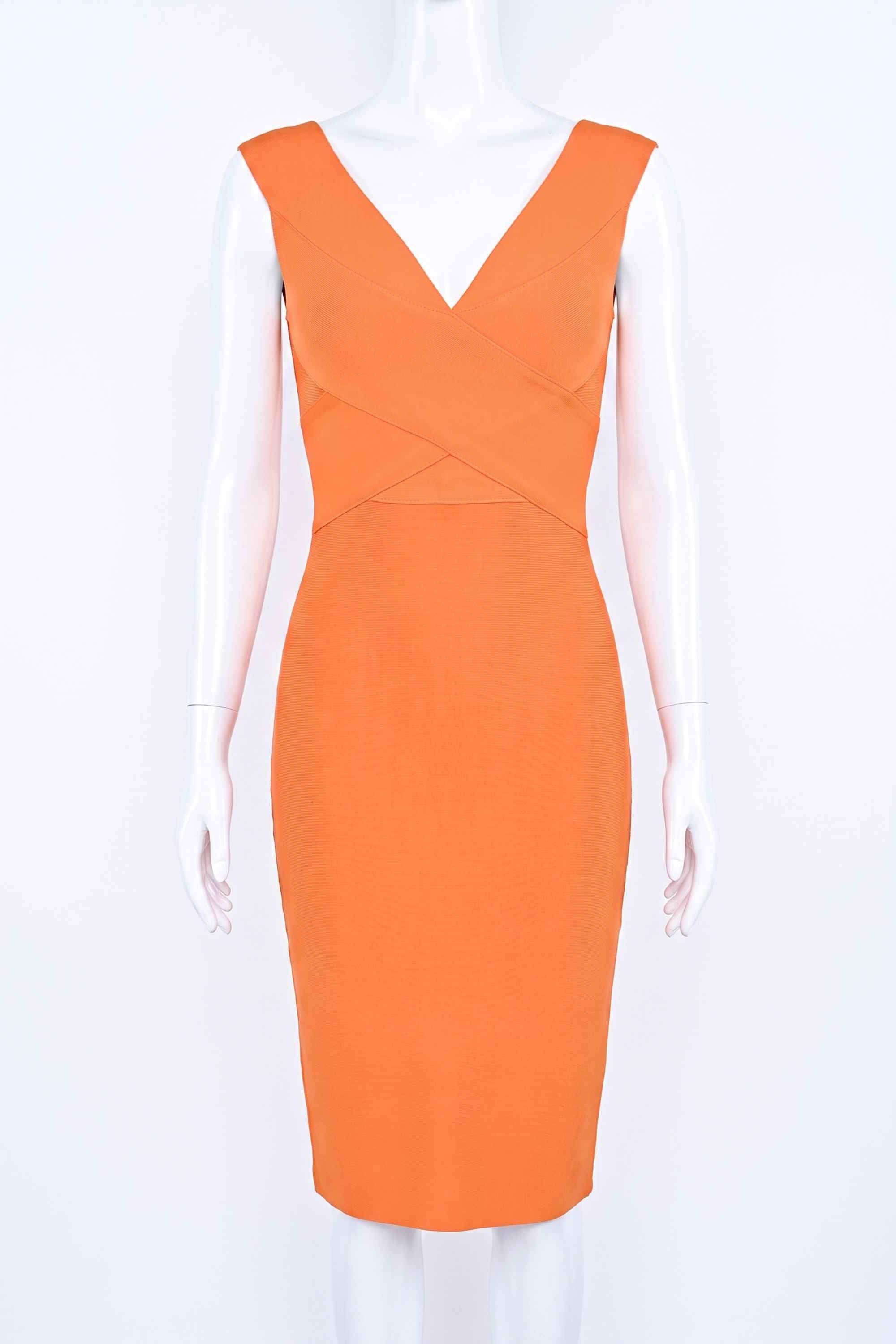 Woman wearing a figure flattering  Ash Bandage Dress - Apricot Orange Bodycon Collection