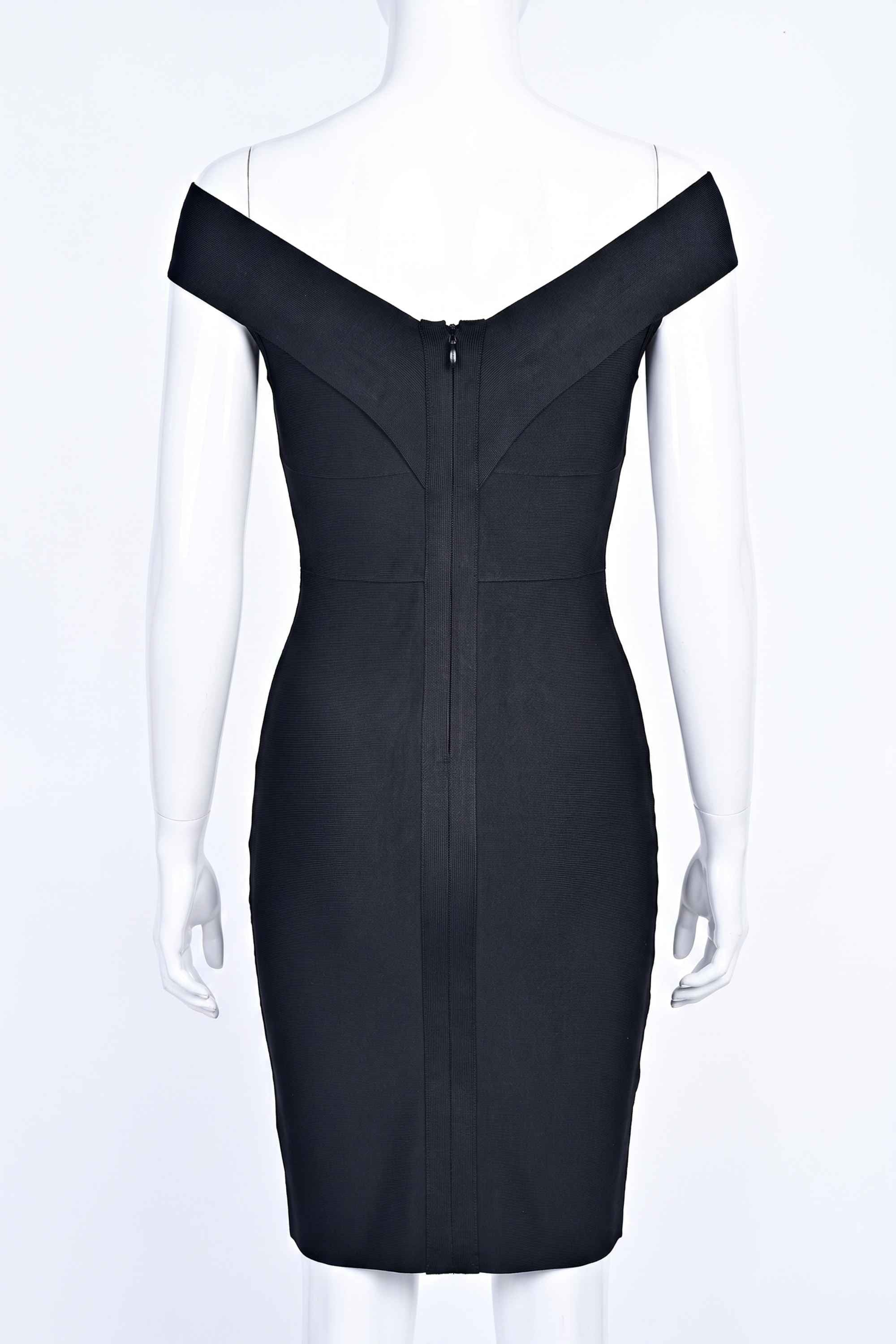 Woman wearing a figure flattering  Ash Bandage Dress - Classic Black Bodycon Collection