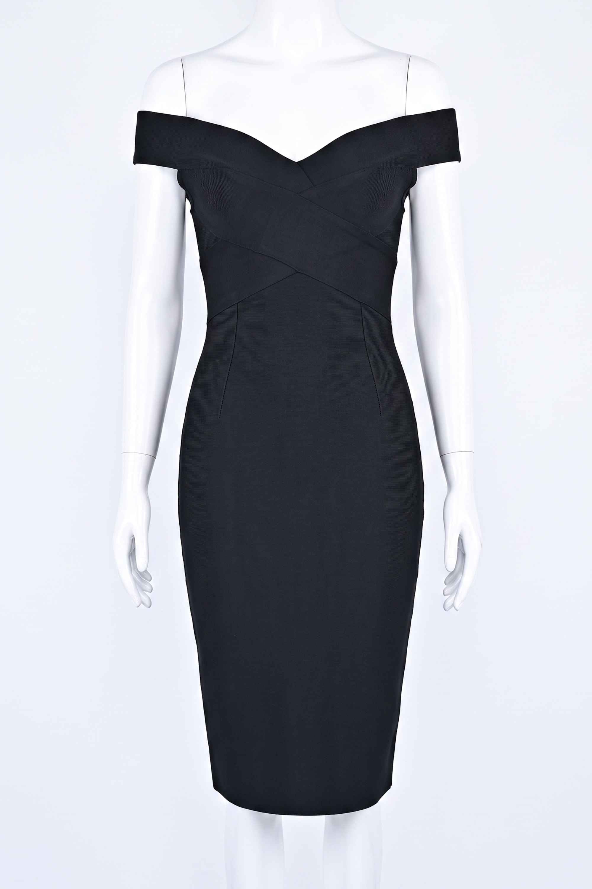 Woman wearing a figure flattering  Ash Bandage Dress - Classic Black Bodycon Collection