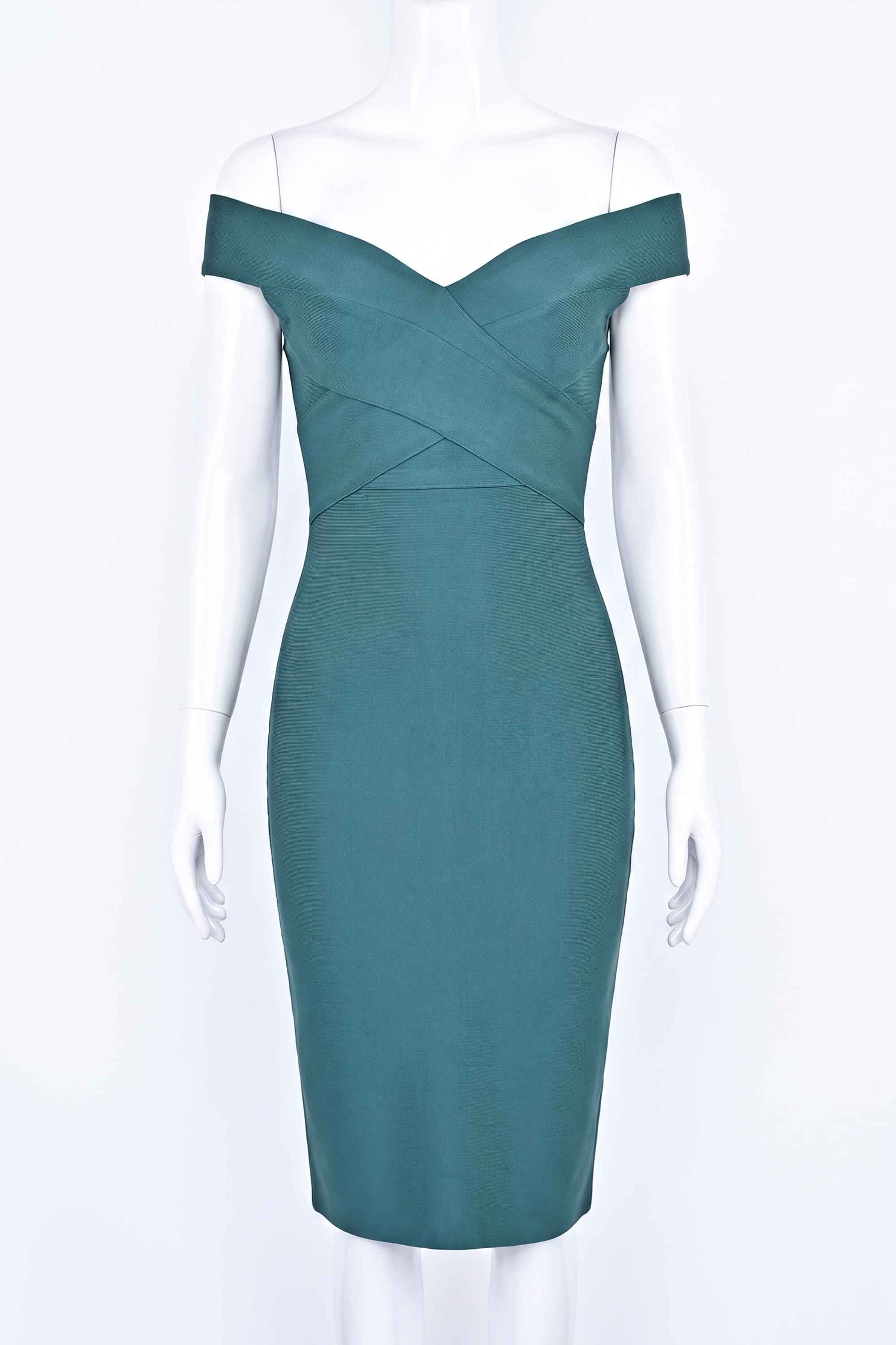 Woman wearing a figure flattering  Ash Bandage Dress - Emerald Green Bodycon Collection