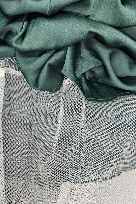 Woman wearing a figure flattering  Mavis Midi Dress - Emerald Green (Sale) BODYCON COLLECTION