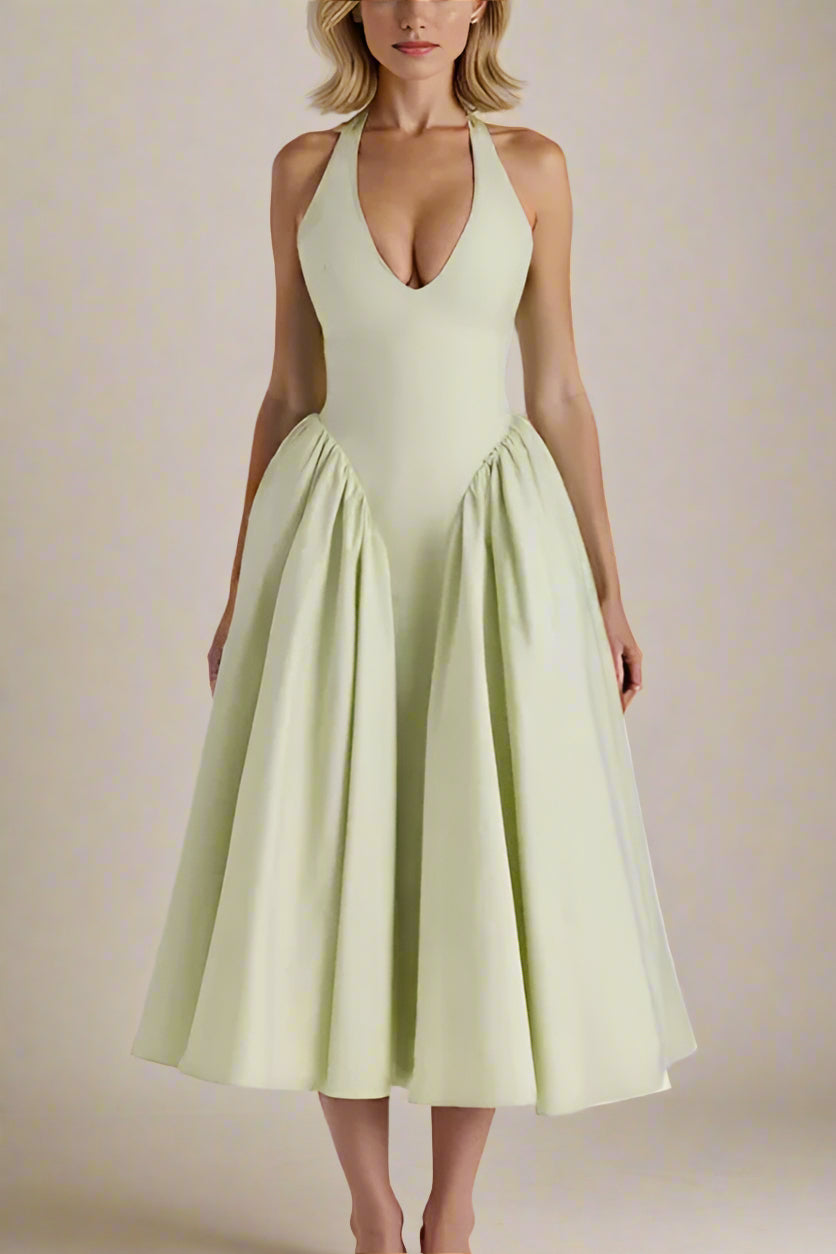 Woman wearing a figure flattering  Austen Bodycon Midi Dress - Pistachio Green BODYCON COLLECTION