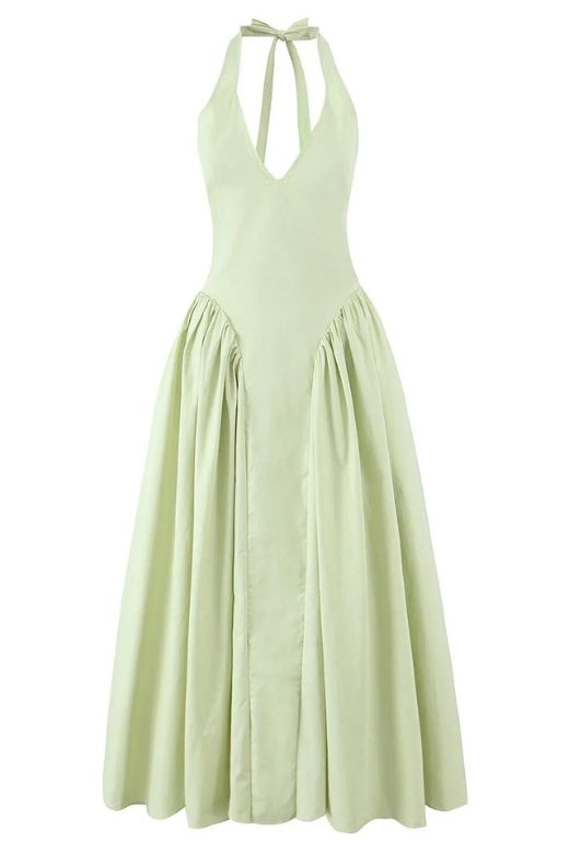 Woman wearing a figure flattering  Austen Bodycon Midi Dress - Pistachio Green BODYCON COLLECTION