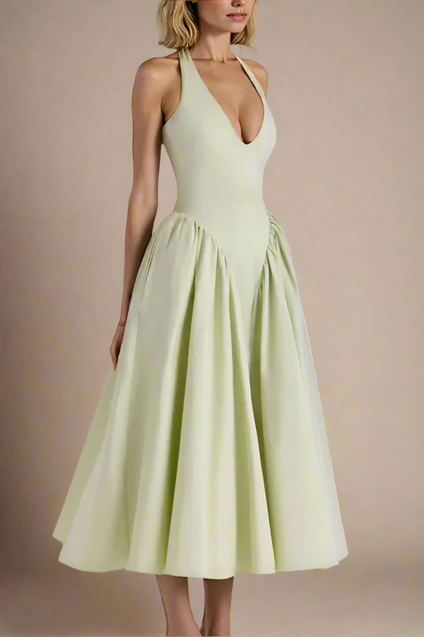 Woman wearing a figure flattering  Austen Bodycon Midi Dress - Pistachio Green BODYCON COLLECTION
